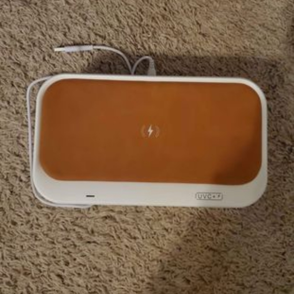 Cell phone charger and UV disinfectant